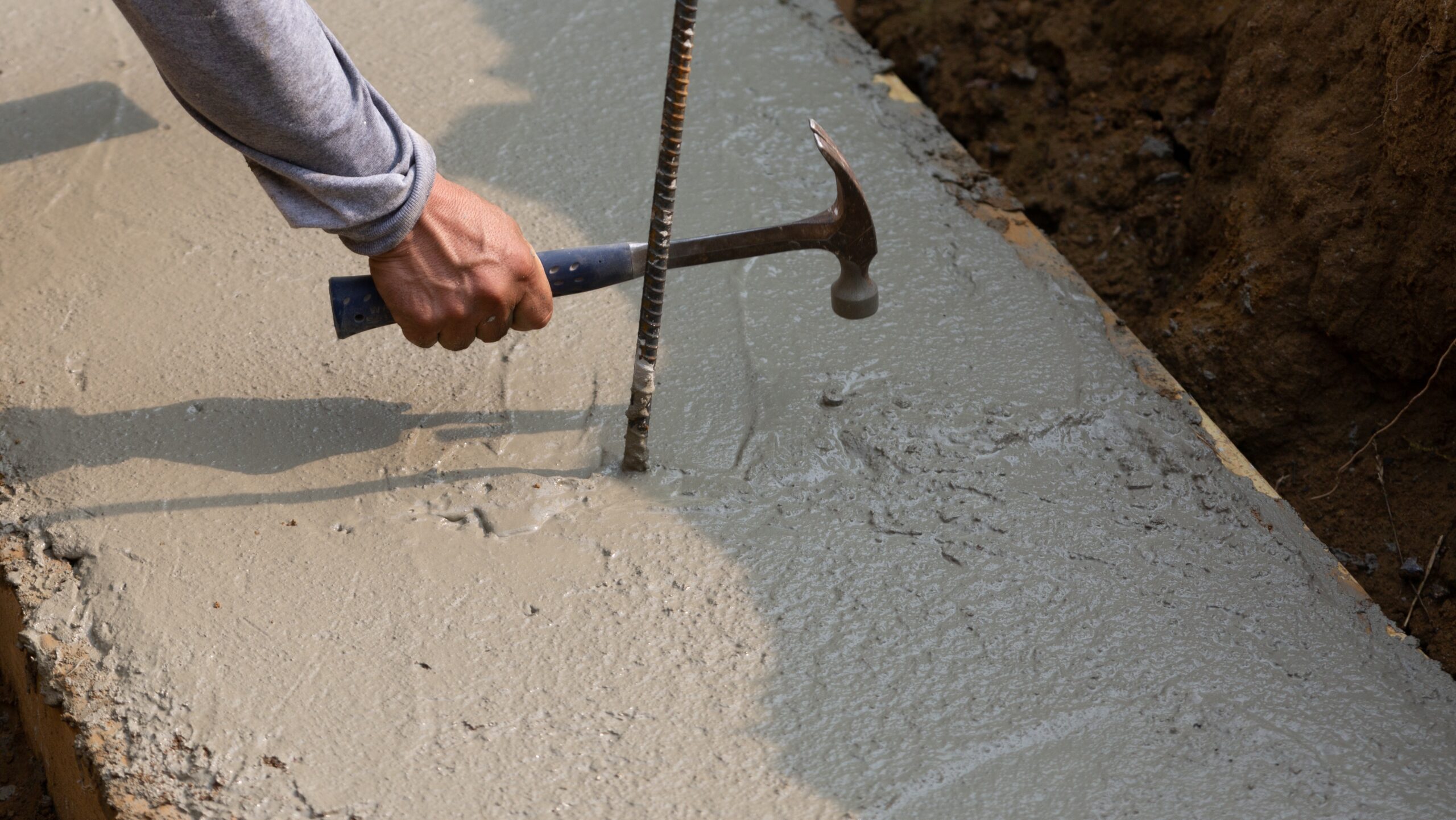 Construction,Site,With,Tools,And,Concrete,Being,Smoothed