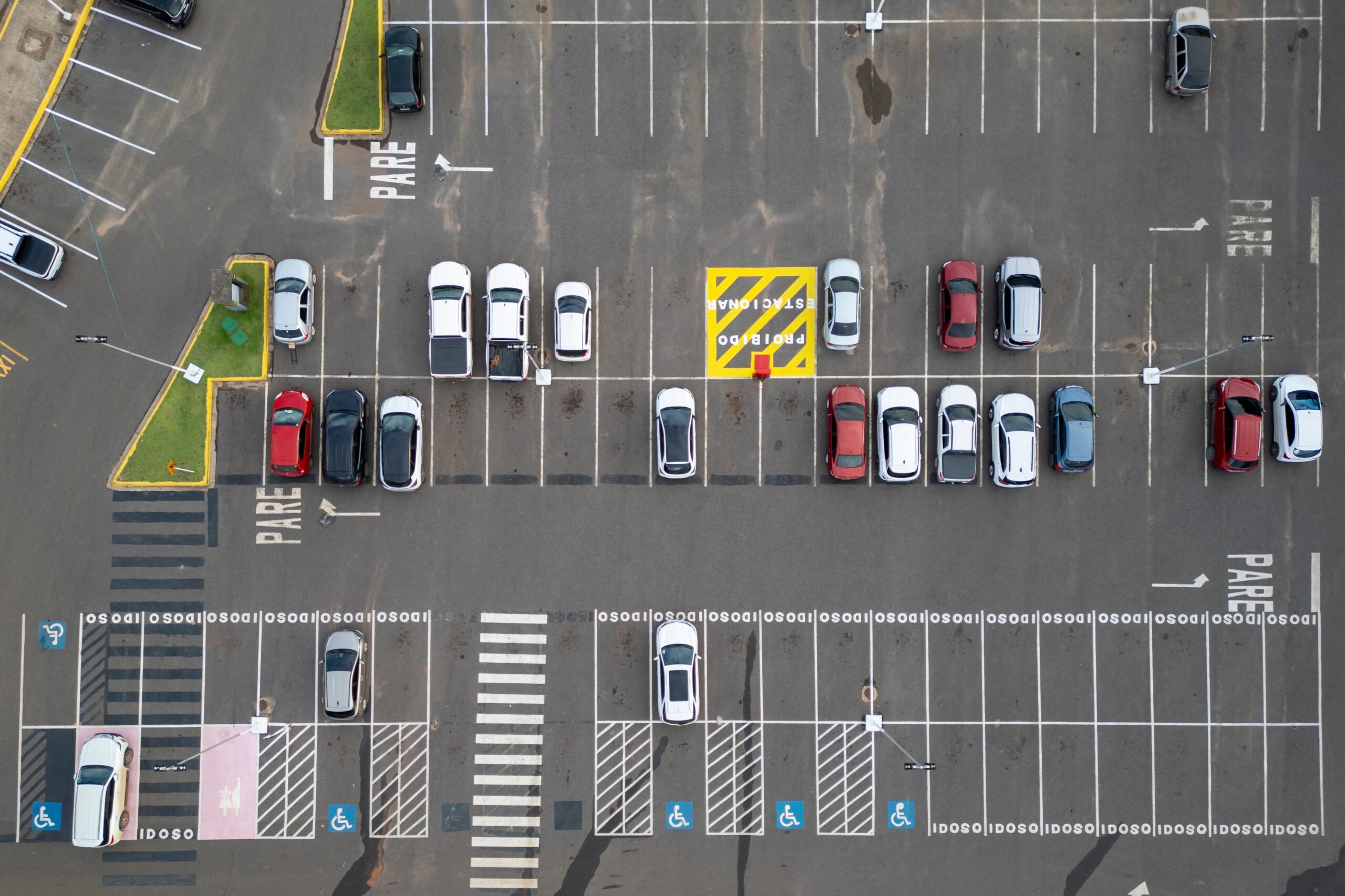 Aerial,View,Of,Expansive,Parking,Lot,With,Cars,Parked,,Empty