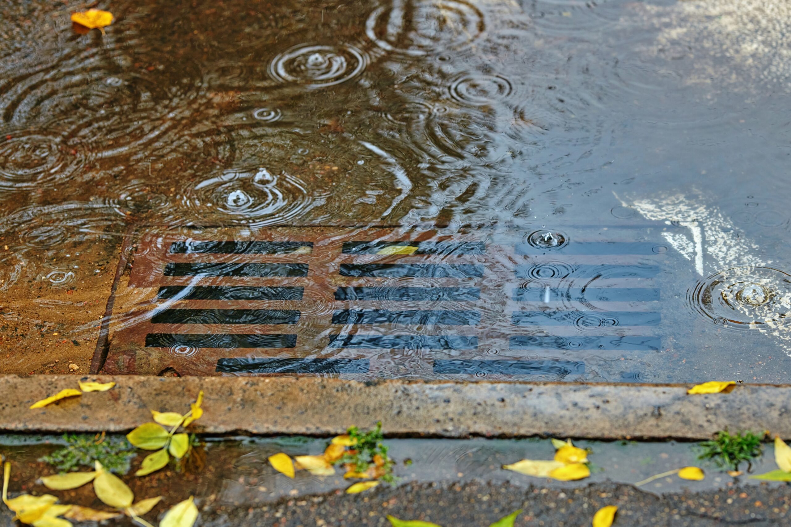 Flooding,Across,Road,During,Rain,,Blocked,Street,Drain.,Plumbing,Problems